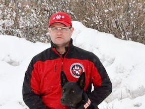 Brian Harmes with Koda who works as a cadaver dog, volunteering for the Canadian Canine Search Corps.