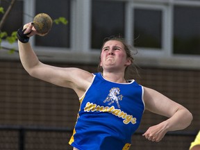BCI's Alexa Windle competes in the midget girls shot put event on Tuesday during the Brant County high schools track and field meet at Kiwanis Field in Brantford. Windle won the event with a throw of 12.71 metres, a Brant County record. (Brian Thompson/The Expositor)