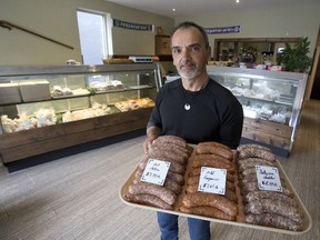 Miki Hambalek is the owner of the Hungary Butcher in London. (Derek Ruttan/Postmedia News)