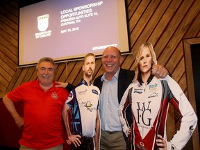 Fred Rose, left, the driving force behind bringing the Pinty's Grand Slam of Curling event to Chatham in September is with Canadian curling legend Kevin Martin, and cutouts of Canadian curling stars Brad Gushue and Jennifer Jones. Gushue and Jones will be participating. Ellwood Shreve/Postmedia Network