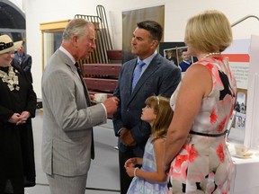 Steve Day meets with Prince Charles at CFB Trenton on June 30, 2017 in a handout photo. Canadian visitors to London are eager to soak in the royal wedding celebrations. THE CANADIAN PRESS/HO-Tom Sandler