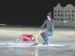 Jafar, played by Matthew den Boer, swings Lago the parrot, played by Marin Ono, in the Canmore Skating Club’s Ice Show called Arabian Tales on Thursday at the Canmore Recreation Centre.