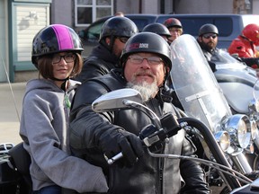 Grade 7 Sherwood Park student Sarah Milne and Steve Enns are all smiles as they get set to ride to Lakeland Ridge School in Sherwood Park on May 11, as part of the Bullying Enns initiative to support youth who have been targeted in school. See Page 3.

Zach Mueller/News Staff