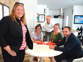 Kyla Woodcock, left, will lead this year's Elgin-Middlesex United Way campaign with the help of volunteer cabinet members from St. Thomas, from left, Maria Fiallos, Chris Herridge, Stacey Hayhoe, and Sean Dyke. This year will be the organization's second without a financial goal as, instead, they are targeting "impact goals" to better reflect United Way's work locally. (Louis Pin/Times-Journal)