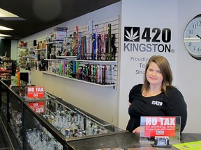 Jennawae McLean, co-owner of 420 Kingston, is seen at the counter of the cannabis accessory store. She said the legalization of cannabis will affect the success of weed paraphernalia shops in Ontario. (Sebastian Bron/The Whig-Standard)