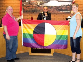 Photo by DAVID BRIGGS/FOR THE STANDARD
Douglas Elliott - vice-president of the Elliot Lake Pride committee, and the committee’s president, Chantal Vaillancourt, displayed the new rainbow flag at Monday’s council meeting.