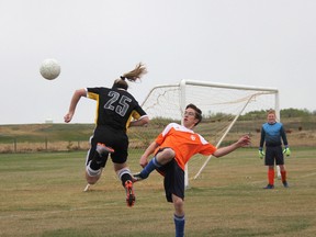 The Hanna Heat U19 team had a home game against Drumheller (red jerseys) on May 7, winning 7-2. On May 9 they repeated the process winning 7-2 again, this time against Didsbury (orange jerseys). The U19 play their next home game in Hanna on May 21 against Three Hills.