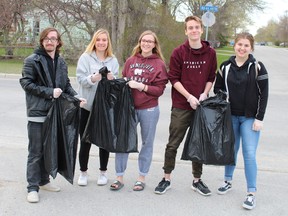 Members of New Life Church’s youth group were out and about in Stonewall on May 11, picking up garbage and spring cleaning for the community. Pictured: Some of the youths who were cleaning up (left to right): Jonathan Griffin, Abigail Enns, Katie Jongstra, Ethan Enns and Sarah Farebrother. (Juliet Kadzviti/Interlake Publishing/Postmedia Network