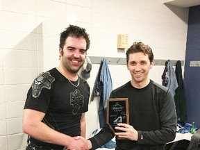 Scott Hennig, right, received a Hockey Alberta longtime and outstanding service award for his years of giving back to the sport of hockey.