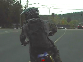 Police are looking for the public's help in identifying and locating the individual pictured here. The dirt bike rider took off when officers attempted to stop him in the New Sudbury area. (Photo supplied)