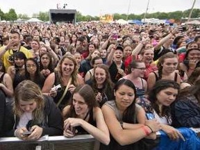 Brian Thompson/Brantford Expositor
Fans cheer during WTFest at Lions Park in Brantford. The music festival has been cancelled for this year.