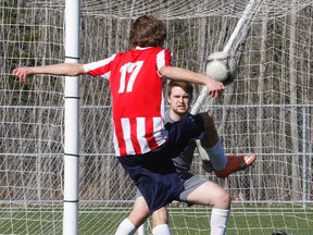Widdifield Wildcats player Daelin Henschel (17) missed on this opportunity against Algonquin Barons netkeeper Tye Lindeman during NDA senior boys soccer action at the Steve Omischl Sports Fields Complex, Thursday. But Widdifield scored twice late in the game to pull out a 4-3 victory to wrap up the regular season schedule with three wins and a tie to finish in first place. Dave Dale / The Nugget