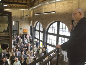 David Billson, CEO of rTraction, addresses a crowd at the launch of RH Accelerator last week. (Derek Ruttan/Postmedia News)