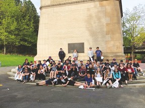 Students and chaperones pose for a group photograph in Spokane, Washington while they were there for the annual Lilac Bloomsday Run.