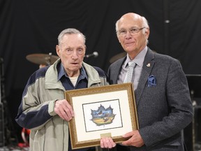 St. Andrews mayor George Pike (right) presents long time volunteer Jim Want with an RM of St. Andrews Volunteer award at the St. Andrews Community Club on May 4. (Brook Jones/Selkirk Journal/Postmedia Network)