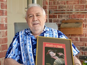 Sitting on the porch of his and his late wife Christina James’ home in Stratford, David James holds a framed cover of the Globe and Mail’s Jan. 1-7, 1983 edition of Broadcast Week Magazine, featuring Christina in her role as Katisha in the Stratford Festival’s production of The Mikado. (Galen Simmons/The Beacon Herald)