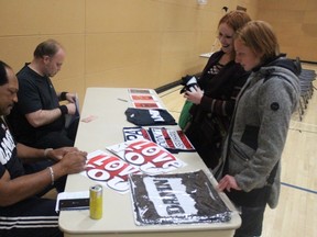 Ron Simmons signed autographs before the CWE ninth anniversary tour at Swartout Hall in the Kerry Vickar Centre on Wednesday, May 16.