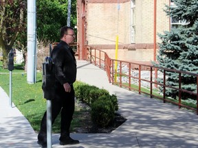 John Paul Stone heads towards the Perth County Courthouse on Friday, May 18, 2018 in Stratford, Ont. (Terry Bridge/Stratford Beacon Herald)