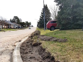 Shawn Hawkins and Leslie Delorme, property owners on Lawson Avenue, are waiting for their front and side yards to be repaired after being damaged by a snowplow in December.
Submitted Photo