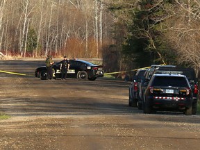 Brundy Avenue in Timmins’ Gold Centre was cordoned off Friday night in an area where the Timmins Police Service say they found a body in a burned vehicle.