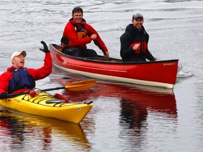 Corbyville's Tyler Thorbergson wins the Mighty Moira River Races' endurance heat Saturday in Corbyville. Trailing him were Paul Terry, background left, of Foxboro and Evan Styles of Courtice. The races were organized by Signal Brewing Company of Corbyville and Cruising Canoes of Belleville.