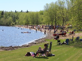 Gregoire Lake Provincial Park opens for the May long weekend after being closed for over two years due to damage from the 2016 wildfires. On May 20, 2018, many visitors enjoyed the summer weather on the beach. Laura Beamish/Fort McMurray Today/Post Media Netwrok