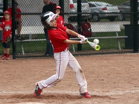 Woodstock Wranglers Braeden Smith makes contact with the ball during the Woodstock Minor Baseball Association's Rookie Baseball Bash tournament in Woodstock, Ont. on Saturday May 19, 2018 during the hitting portion of the skills competition. Greg Colgan/Woodstock Sentinel-Review/Postmedia Network