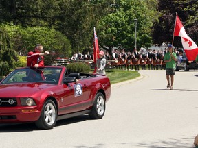 Walter Gretzky, the parade marshal, waves to the crowd in Thamesford, Ont. on Monday May 21, 2018 during the 99th Calithumpian parade. Greg Colgan/Woodstock Sentinel-Review/Postmedia Network