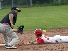 Canadian junior team third baseman Isaac Lefebvre slides safely into second against Team Bigman in Innerkip, Ont. on Saturday May 19, 2018 during the Victoria Day weekend fastball tournament. Greg Colgan/Woodstock Sentinel-Review/Postmedia Network