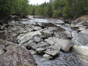 About 30 people took a guided hike to the Camus Rapids on the Groundhog River on Saturday.