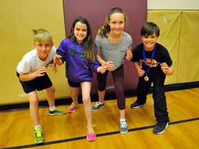 Over 50 members of the Lynndale Heights Public School wrestling team combined to win 38 medals at the Brant County Wrestling Tournament in Brantford earlier this month. Pictured are team members Tyler Hofland, Clarissa Trowbridge, Yara Ziser and Sullivan Shrubsole.
JACOB ROBINSON/Simcoe Reformer