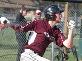 Wallaceburg Tartans' Curtis McCallum follows through after hitting the ball during a game in the 2018 LKSSAA baseball season.