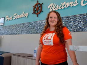 Paige Palmer stands inside the newly minted Port Stanley Visitor's Centre, opened on the main street this weekend to crowds of out-of-town tourists. The building will serve as Elgin County's tourism hub, one recently houses in the nearby Port Stanley Festival Theatre building. (Louis Pin/Times-Journal)