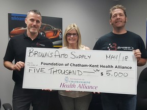 Justin Brown (left), general manager of Brown's Auto Supply, presents a $5,000 cheque to Mary Lou Crowley, executive director of the Foundation of Chatham-Kent Health Alliance, and Dan Van Moorsel, organizer of The Final Push, an initiative to raise funds towards the foundation's $6.9-million Diagnostic Imaging Equipment Renewal Campaign. Handout/Postmedia Network