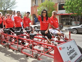 A group from CK Cardiac Imaging Centre return from a ride down King Street West in Chatham on Heart & Stroke's Big Bike on May 17. About 45 teams from Chatham-Kent have raised funds to participate this year. The bike was also scheduled to be in Tilbury May 22, back in Chatham May 23 and 24 and in Blenheim May 25. Tom Morrison/Chatham This Week