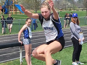 Kaylin Rose takes off in the senior girls triple jump event, ending up with a fourth place finish. SUBMITTED