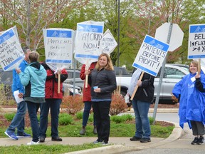 Registered practical nurse Laurie Hills, centre, among protesters walking the picket line by the Owen Sound Medical Centre on the first day of their strike Tuesday. (Scott Dunn/The Sun Times)