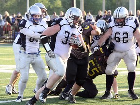 Louis Chartrand (30) runs the ball for the Sudbury Spartans against the North Bay Bulldogs last season. Ben Leeson/The Sudbury Star/Postmedia Network