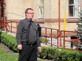 John Paul Stone walks towards the Perth County Courthouse on Wednesday, May 23, 2018 in Stratford, Ont. Terry Bridge/Stratford Beacon Herald/Postmedia Network