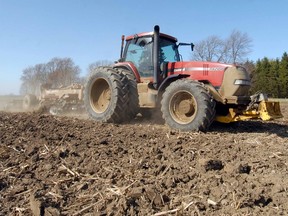 Mike Van Straaten tills land north of Stratford in this file photograph from 2012. File photo/Scott Wishart/The Stratford Beacon Herald