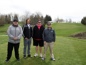 Indian Hills Golf Club in Lambton Shores is open for the golf season, and is open to the public and members. Above, the team of Indian Hills Golf Club employees stand by the fairway at the first hole on May 11. From (l-r) are pro shop attendant  Will Milliken-Wentz, general manager Ken Hoare, food and beverage manager Robbie Jackson and golf pro Jamie Reitknecht. (William Proulx/Exeter Lakeshore Times-Advance)