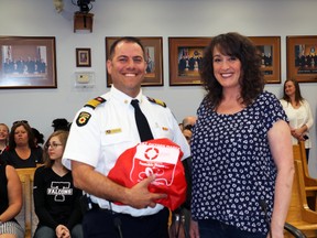 The Hard Rock Animal Hospital in Timmins made a special donation this week to the Timmins Fire Department.  Hospital representative Debbie St. Louis donated six pet-sized oxygen resuscitation masks to be used for rescuing animals that might be overcome by smoke in a house fire. She said the Hard Rock hospital was pleased to give back to the community. She made the presentation to Fire Chief Normand Beauchamp who said with the number of working fires in Timmins each year, there would indeed be occasions where the resuscitation masks would save pet lives. The presentation was made Tuesday at the opening of the regular city council meeting.