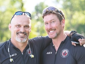 Wounded Warriors Ambassador Matt Muzzi (left) with Ian Norman at the beginnning of the Highway of Heros bike ride in Ontario.