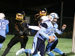 St. Benedict Bears quarterback Adam Rocha in action lasts season during the 2017 SDSSAA senior boys football championship at James Jerome Sports Complex. Gino Donato/Sudbury Star/Postmedia Network