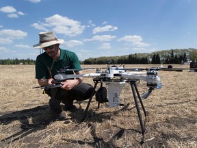 Drone pilot Jeremie Leonard from Biocarbon Engineering will be helping the Canadian Forest Service for the first-ever Canadian trial of using drones to plant tree seeds. The drone will be used in northern Alberta to plant. Taken on Wednesday, May 23, 2018. Greg Southam / Postmedia