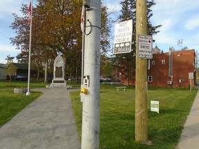 Brant County council is working on amending the sign bylaw to prohibit the placing of commercial signs on boulevards and lawns of memorial parks, cenotaphs and cemeteries. A sign placed by the county at Memorial Park in St. George does not seem to be working. (Submitted Photo)