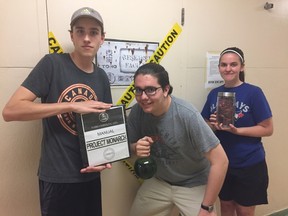 Drama students William Sawyer, left, Andrew Bissonnette and Emily Taylor-Bond have been working hard with the rest of their class designing an “escape room” at Arthur Voaden secondary school. The escape room challenges participants to solve a set of clues that will ultimately free them from the room. (Laura Broadley/Times-Journal)