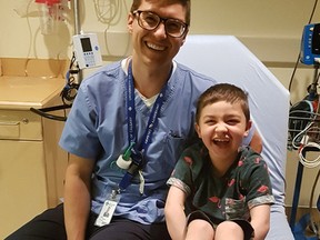 PHOTO SUPPLIED
Nurse Jonas Vaskas with Oliver Lambright at the Alberta Children’s Hospital in Calgary.