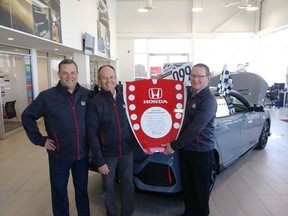 Pictured in photo, left to right: New Vehicle Sales Manager Ian Fleming, Fixed operations Manager Ron Lauzon, and Pre-Owned Sales Manager
Todd Ryan.