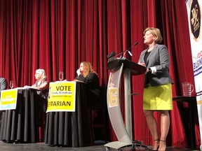 BRUCE BELL/THE INTELLIGENCER
Moderator Suzanne Hunt (right) goes over the rules for the Belleville and District Chamber of Commerce debate for the provincial election candidates at the Empire Theatre Thursday evening. The candidates included (from left) Liberal Robert Quaiff, Conservative Todd Smith, NDP Joanne Belanger and Libertarian Cindy Davidson.